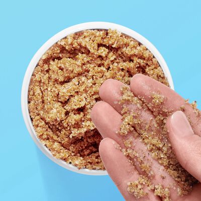 Sugared Koffie™ Almond Milk Body Scrub stacked with other Drunk Elephant body products