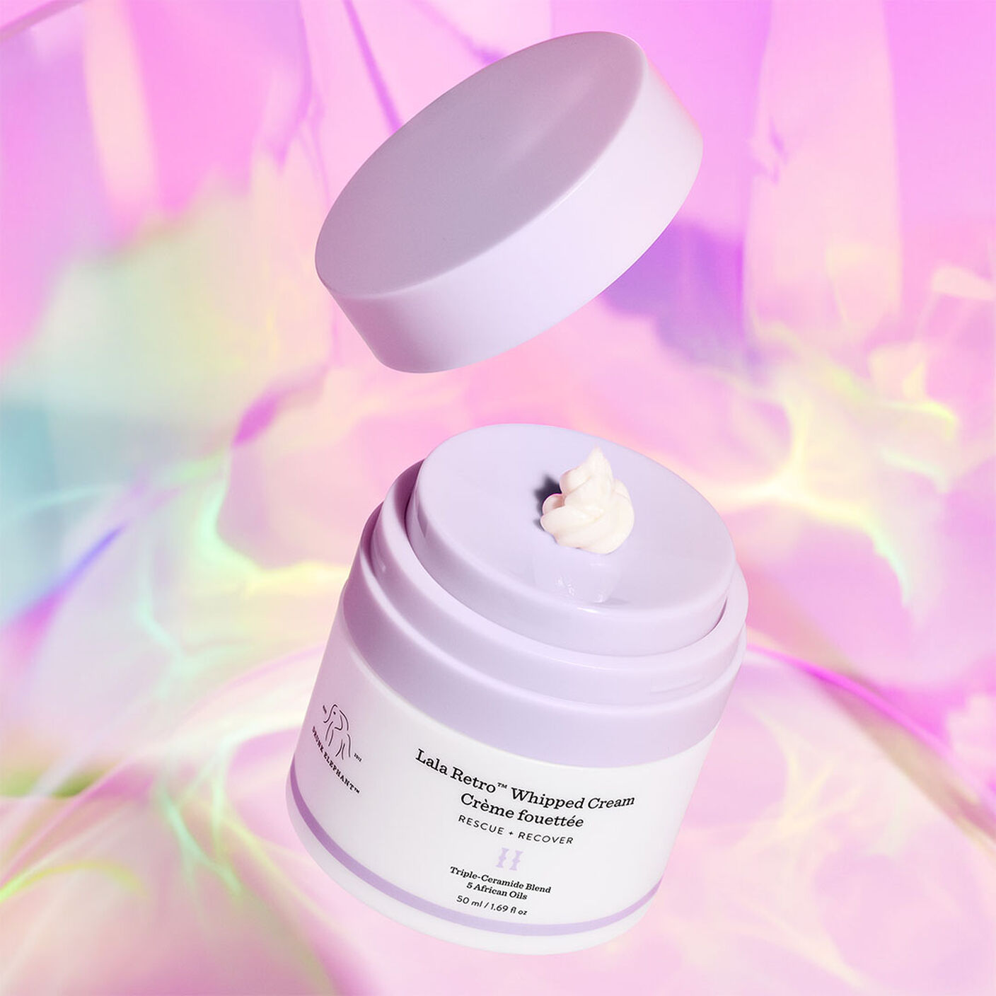 Lala cream with a pump of cream atop the container. 