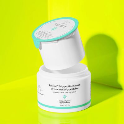 Protini Cream's refills going into empty jar