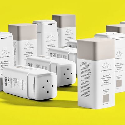 Sweet Pitti™ Deodorant Creams arranged in rows, some tipped over against a yellow background.