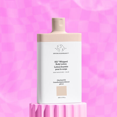 Sili™ Whipped Body Lotion against a pink background