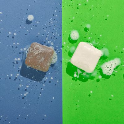 A wet Juju Bar against a blue background on the left, next to a wet Pekee Bar against a green background