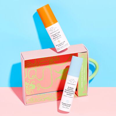 Day Dream Duo with C-Firma™ Fresh Day Serum on top of the packaging and B-Hydra in front of the packaging