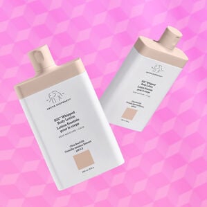 Two Sili Whipped bottle in mid air