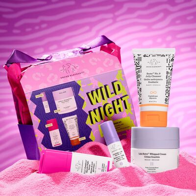 Beste No. 9, T.L.C. Framboos, Lala Retro, and Ceramighty next to Wild Night: The Evening Kit bag with pink sand underneath