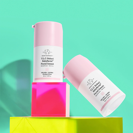 photo of two TLC Sukari Babyfacial with one tilted against the other on colored lucite bloc