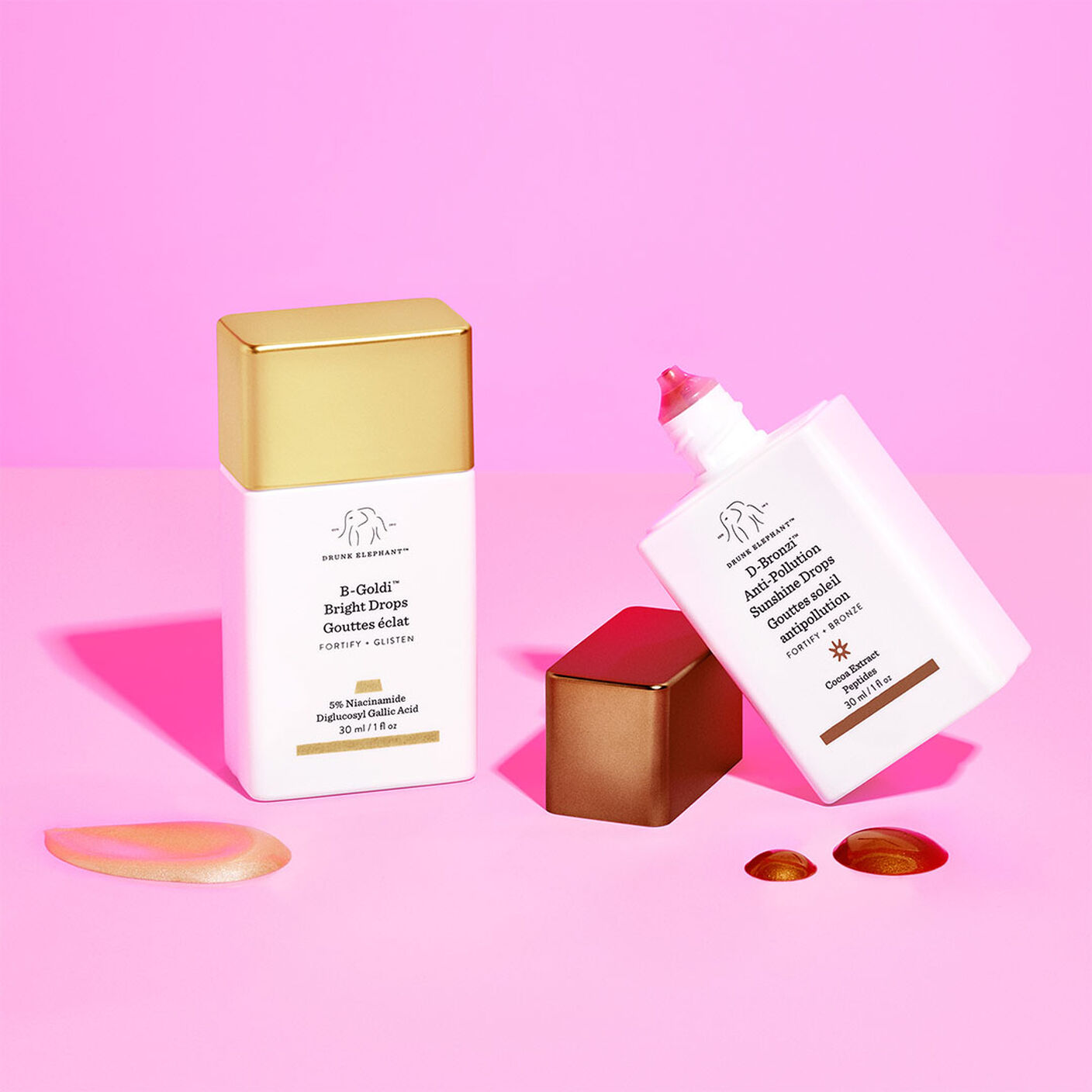 B-goldi avec texture, étalez-le avec D-Bronzi sans le capuchon avec des gouttes de sérum à côté.