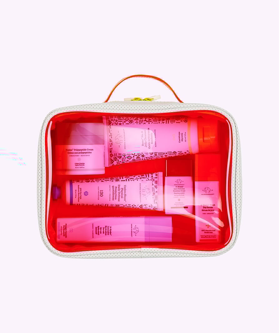 Trousse Dopp l'ensemble Dopp ouvert comprend une crème Protini en format régulier, un nettoyant gel Beste n° 9, Umbra Sheer, D-Bronzi, C-Firma Fresh et B-Hydra avec un ensemble Dopp fermé.